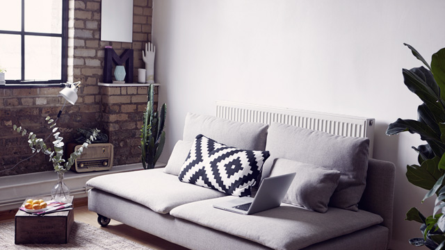 Cozy grey sofa in livingroom 