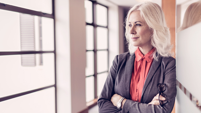 Confident businesswoman looking outside