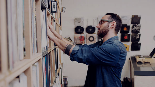 guy in record store small overlay