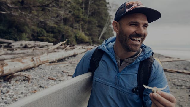 Happy man enjoying weekend surfing small overlay